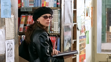 Still from Notting Hill, Julia Roberts browsing in a bookshop