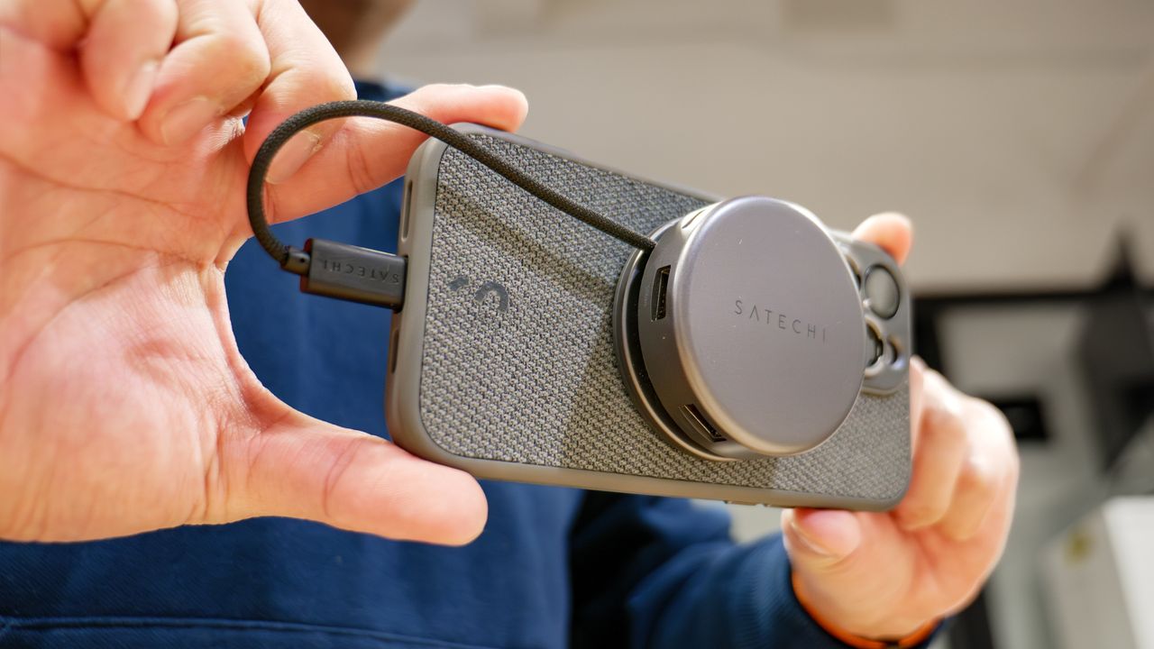 Satechi OntheGo 7-in-1 Multiport Adapter connected to iPhone.