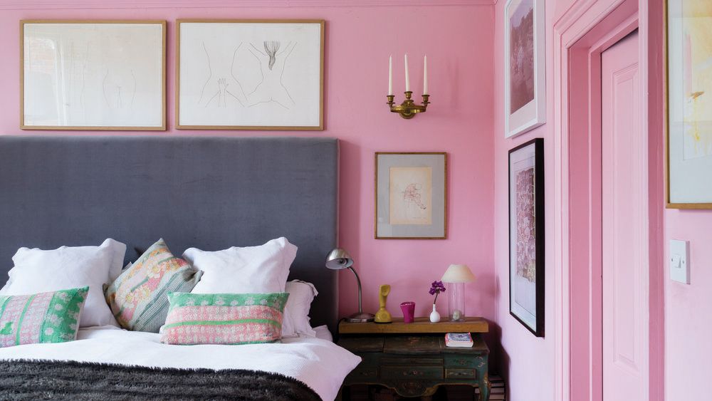 Pink bedroom with grey headboard