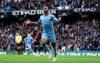 Manchester City forward Raheem Sterling celebrates scoring a goal