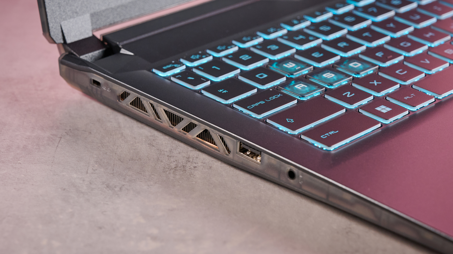 Close-up of left-side ports on the MSI Cyborg 15 on a desk