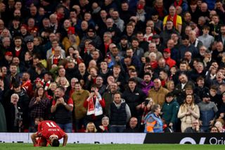 Mohamed Salah celebrates scoring the team's second goal during the English Premier League football match between Liverpool and Brighton and Hove Albion at Anfield in Liverpool, north west England on November 2, 2024.