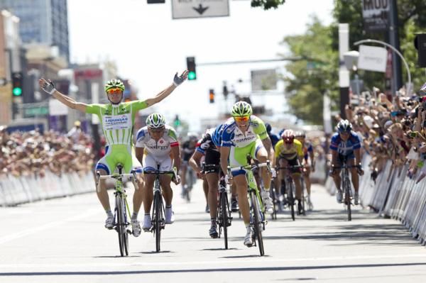 Daniel Oss (Liquigas-Cannondale), right, wins the final stage while his teammate Elia Viviani already has his hands up in celebration.