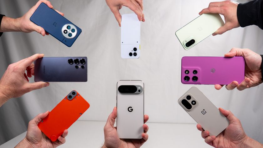 A collection of 2025 smartphones including a Google Pixel 10 Pro XL, CMF Phone 2, Samsung Galaxy S25 Ultra, OnePlus 13, Fairphone 6, OnePlus 15R, Motorola Moto G 2026, and OnePlus 15