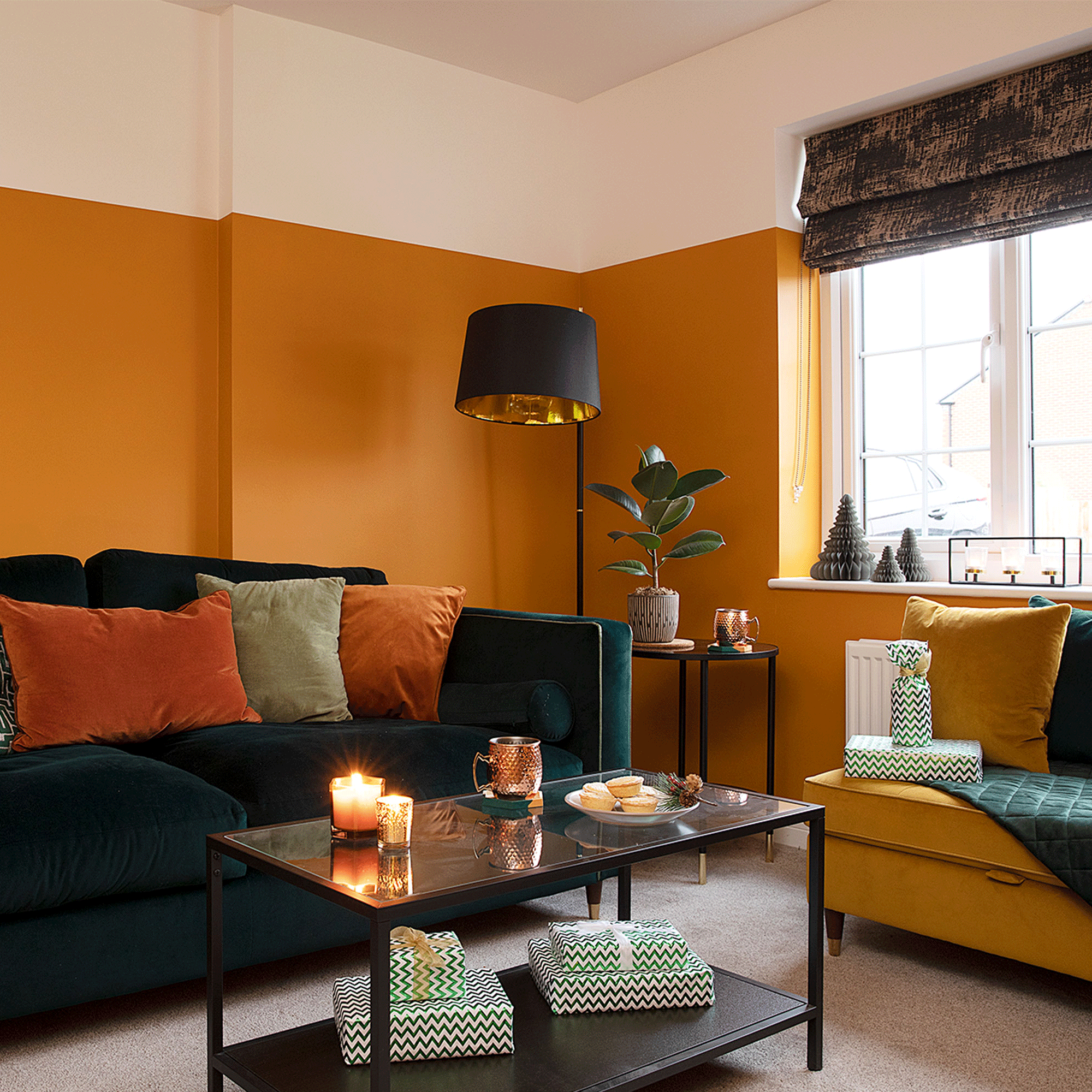Yellow living room with blue sofa