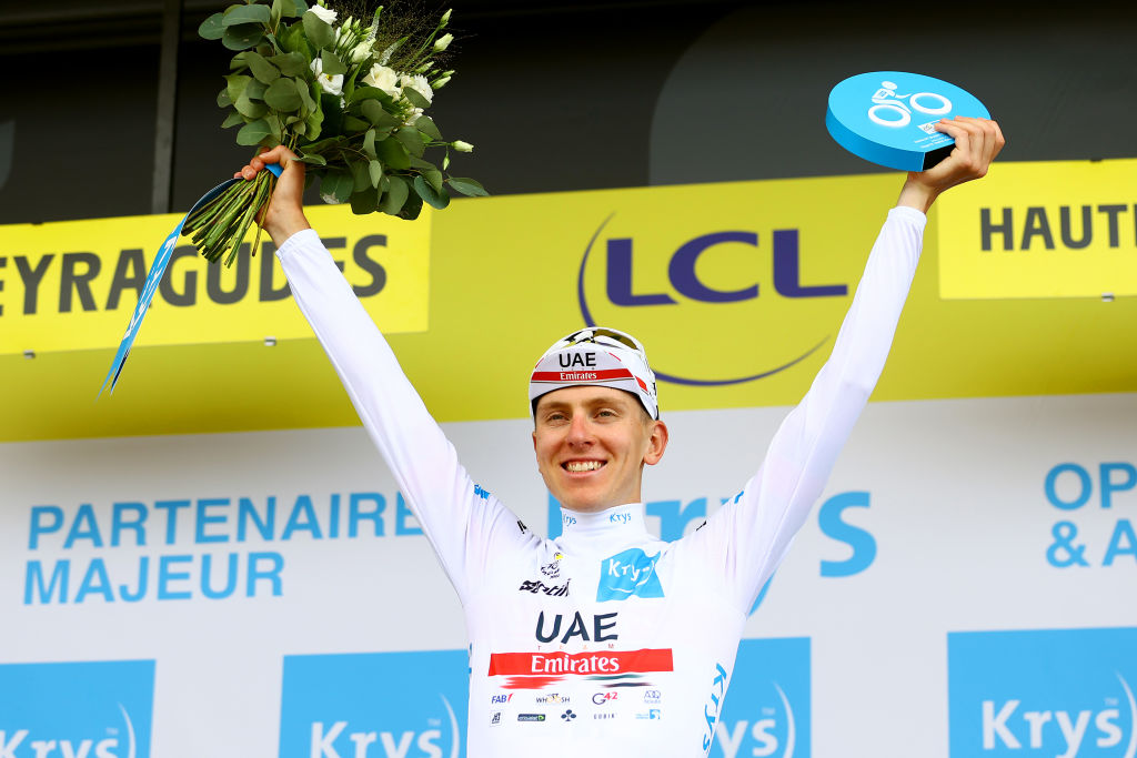 PEYRAGUDES FRANCE JULY 20 Tadej Pogacar of Slovenia and UAE Team Emirates White Best Young Rider Jersey celebrates at podium during the 109th Tour de France 2022 Stage 17 a 1297km stage from SaintGaudens to Peyragudes 1580m TDF2022 WorldTour on July 20 2022 in Peyragudes France Photo by Michael SteeleGetty Images