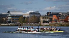 Two teams of rowers on the River Thames