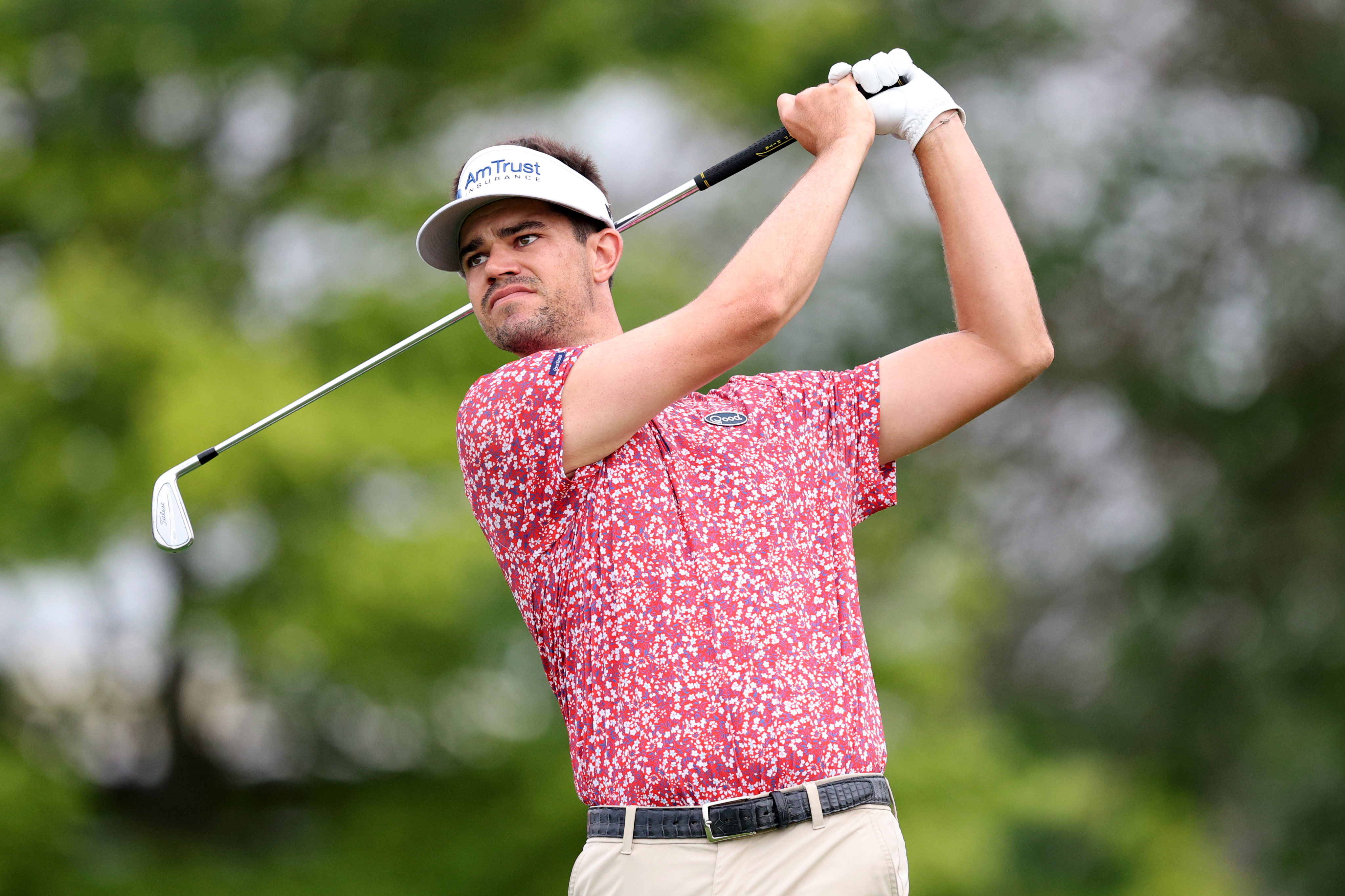 Beau Hossler hits an iron shot