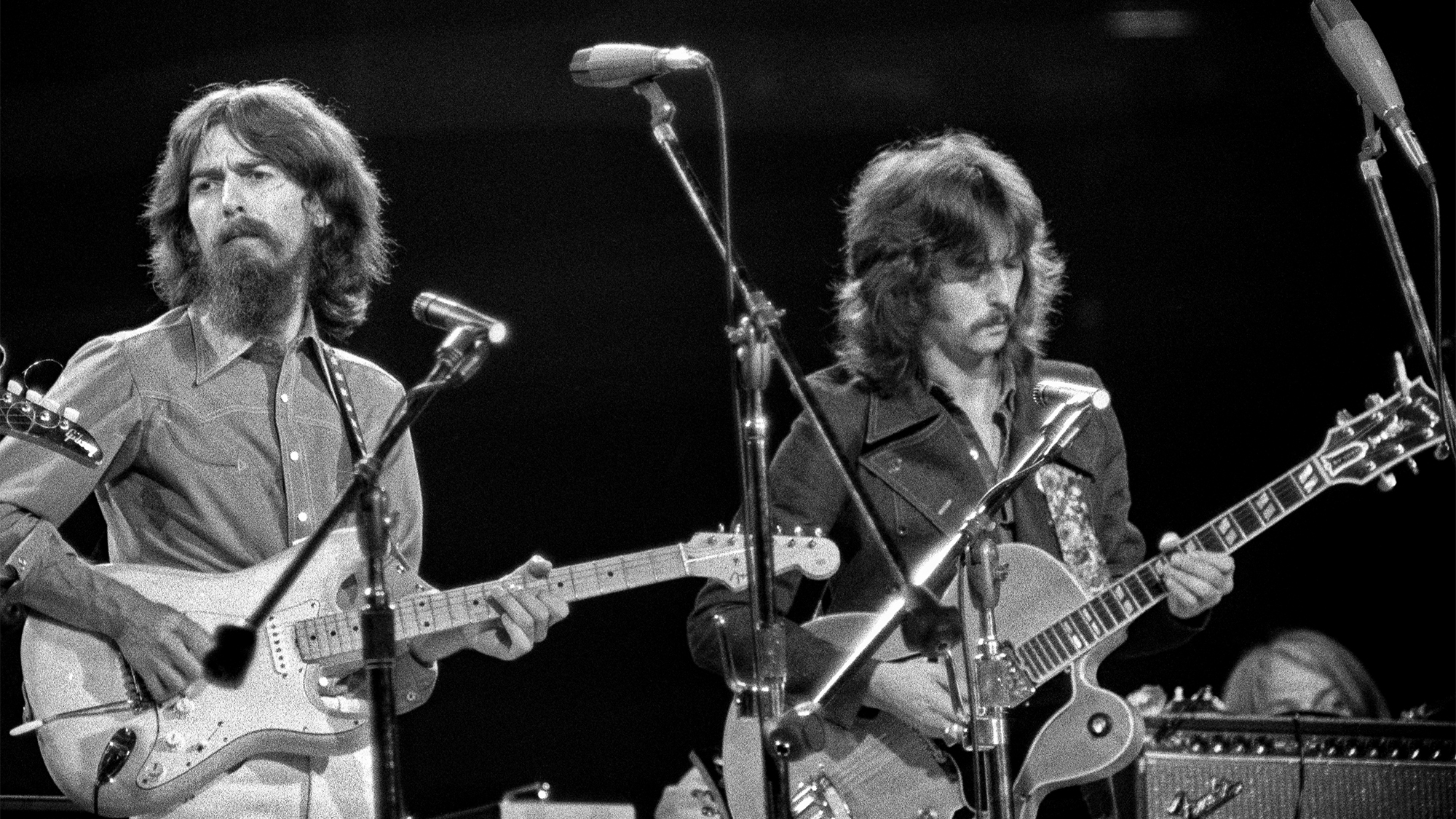 George Harrison and Eric Clapton performing at the Concert for Bangladesh at Madison Square Garden, August 1971.