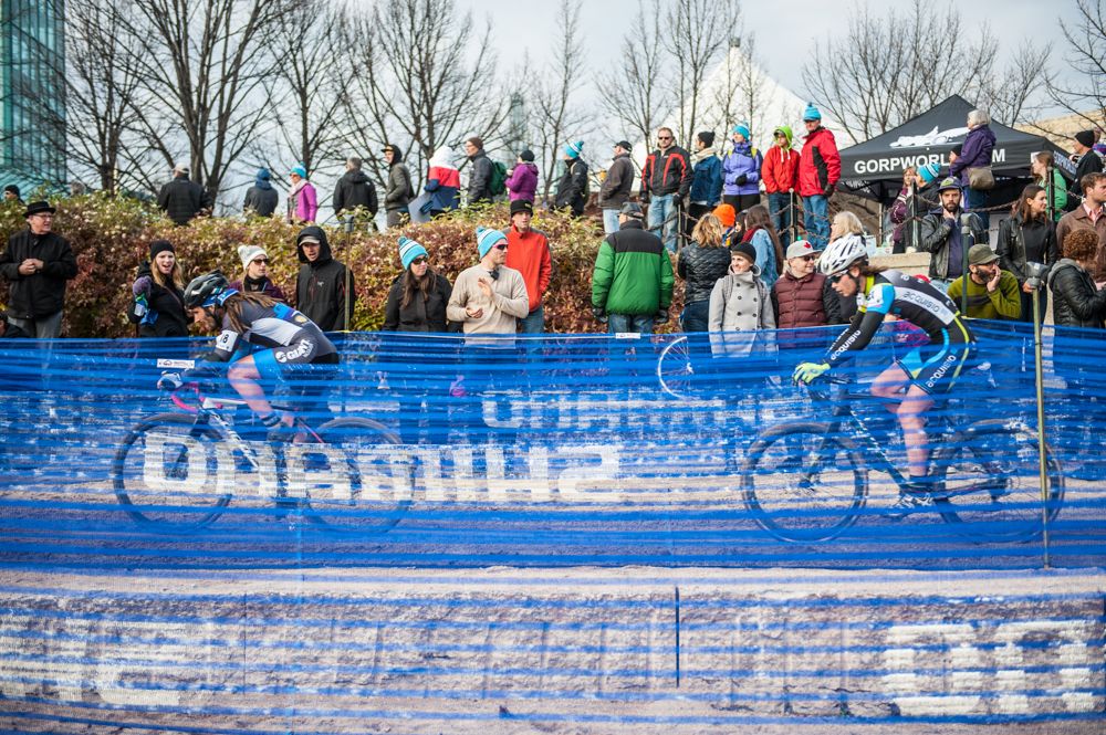 Spectators crowded around three stretches of sand pits