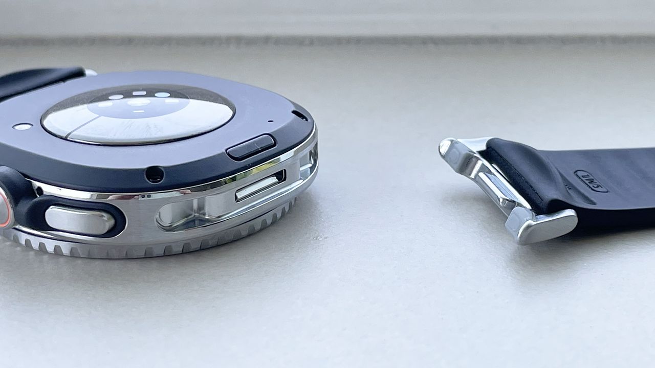Close-up of the back of the Samsung Galaxy Watch 8 Classic showing the new Dynamic Lug strap system with one strap disconnected