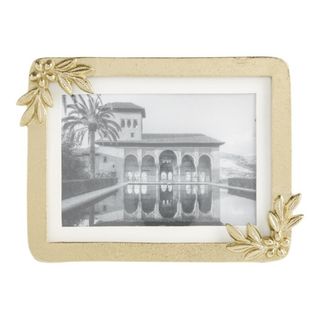 Gold picture frame with floral details