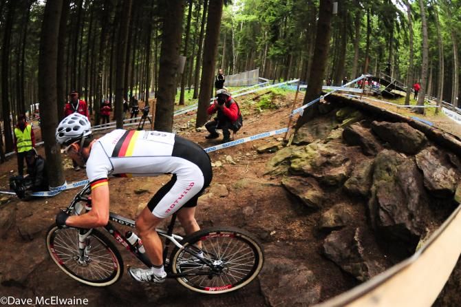 A German rider clears one of the drops