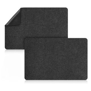 A cut out of two grey felt heat resistant air fryer mats