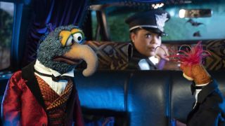 Gonzo and pepe the king prawn in yvette nicole brown's limo in muppets haunted mansion