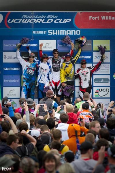Elite men's downhill World Cup podium in Fort William, Scotland
