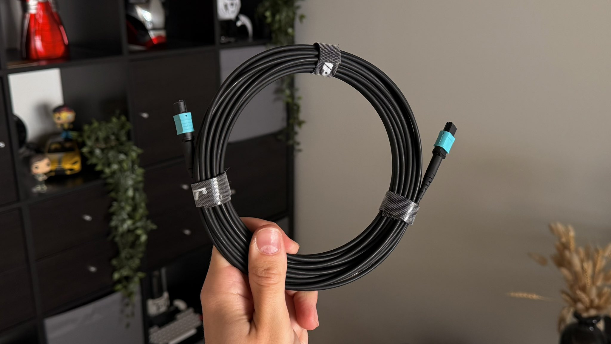 Ruipro Fiber HDMI Cable held in a hand