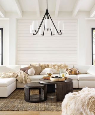 Cozy white living room with sofa
