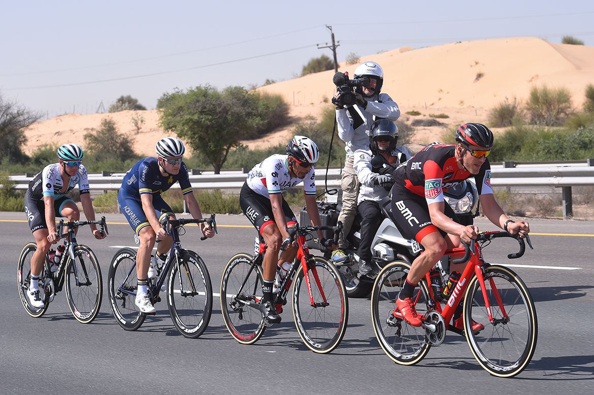A cameraman keeps a watchful eye on the break