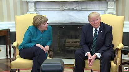 Trump does not shake hands with Angela Merkel