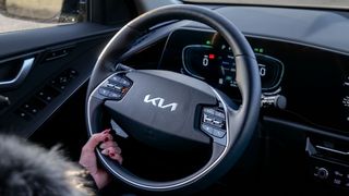 2024 Kia Niro PHEV SX Touring steering wheel.