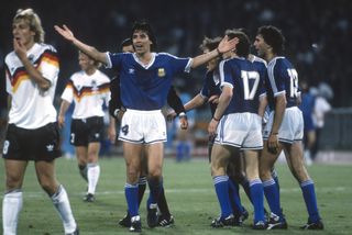 Argentina midfielder Jose Basualdo (centre) appeals a decision in the 1990 World Cup final against West Germany.