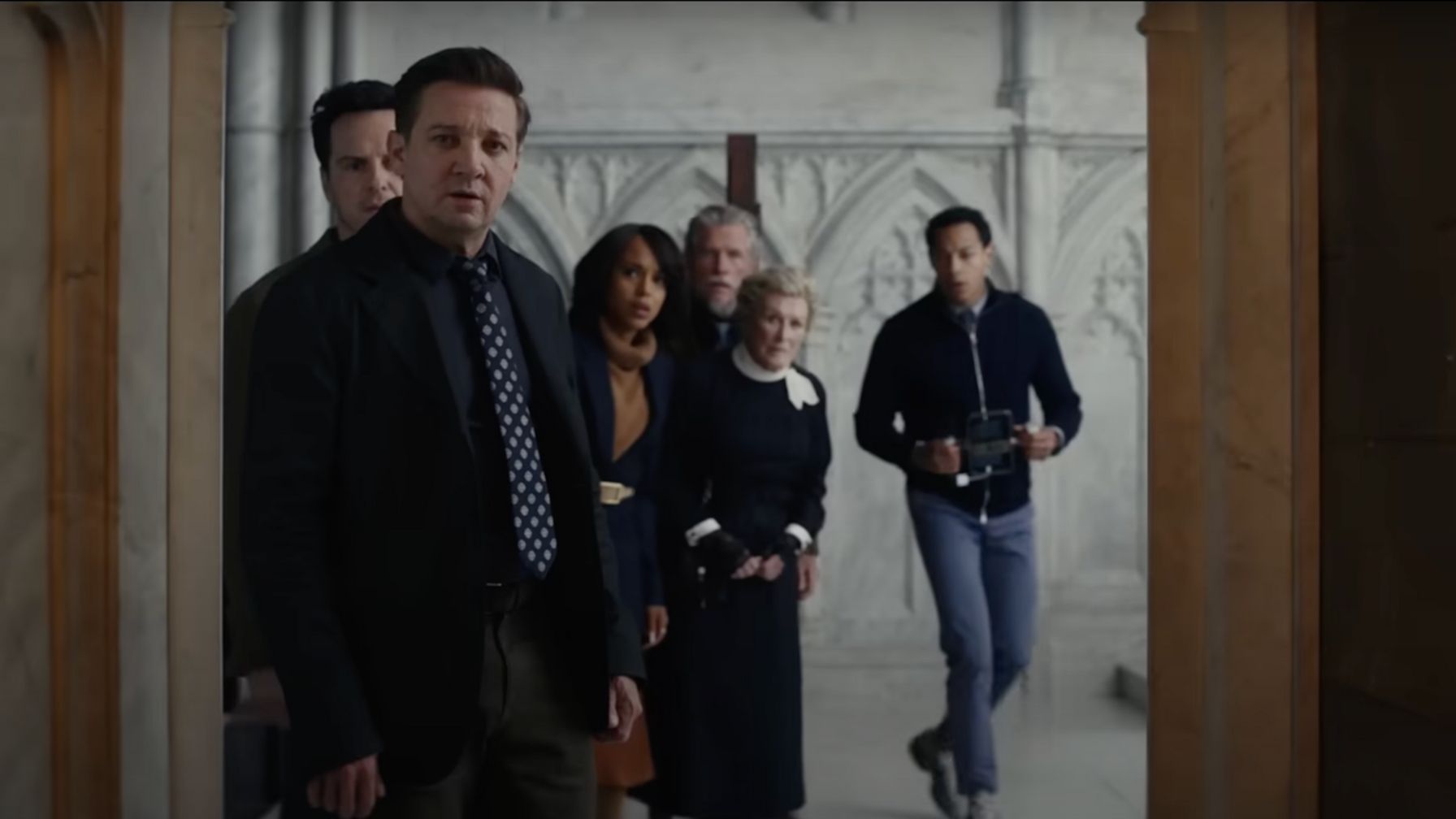 an image of Jeremy Renner, Andrew Scot, Kerry Washington, and Glenn Close from the trailer for the new Knives Out film