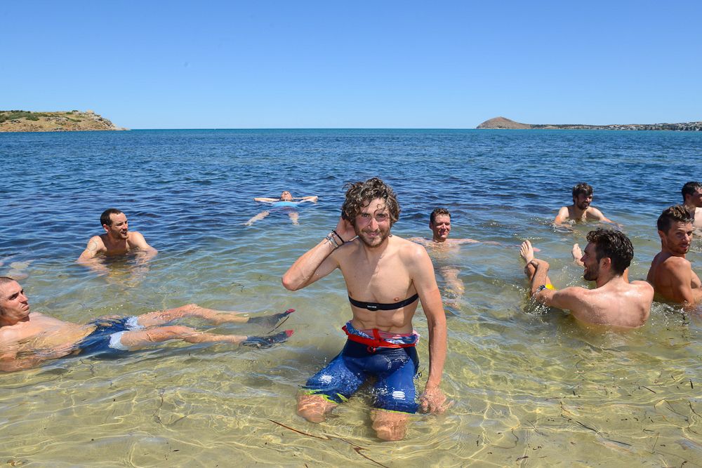Bahrain-Merida rider Manuele Boaro has a swim in 41 degree Celsius heat with other riders after finishing on the third day of the Tour Down Under