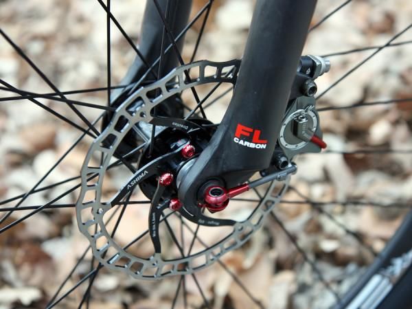 Ashima's new pancake hydraulic disc brake and other boutique components help keep Crumpton's new carbon fiber 29er below 17lb.