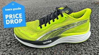 Puma Velocity Nitro 3 running shoe in bright yellow/green with price drop tag top left