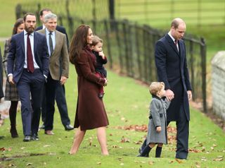 Catherine, Duchess of Cambridge, Prince William, Duke of Cambridge, Prince George of Cambridge, Princess Charlotte of Cambridge, Michael Middleton, James Middleton and Pippa Middleton attend Church on Christmas Day on December 25, 2016 in Bucklebury, Berkshire