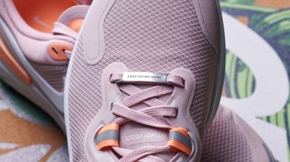 Gifts for fitness lovers: Oakdene designs Personalised Metal Shoe Tag on pink trainer