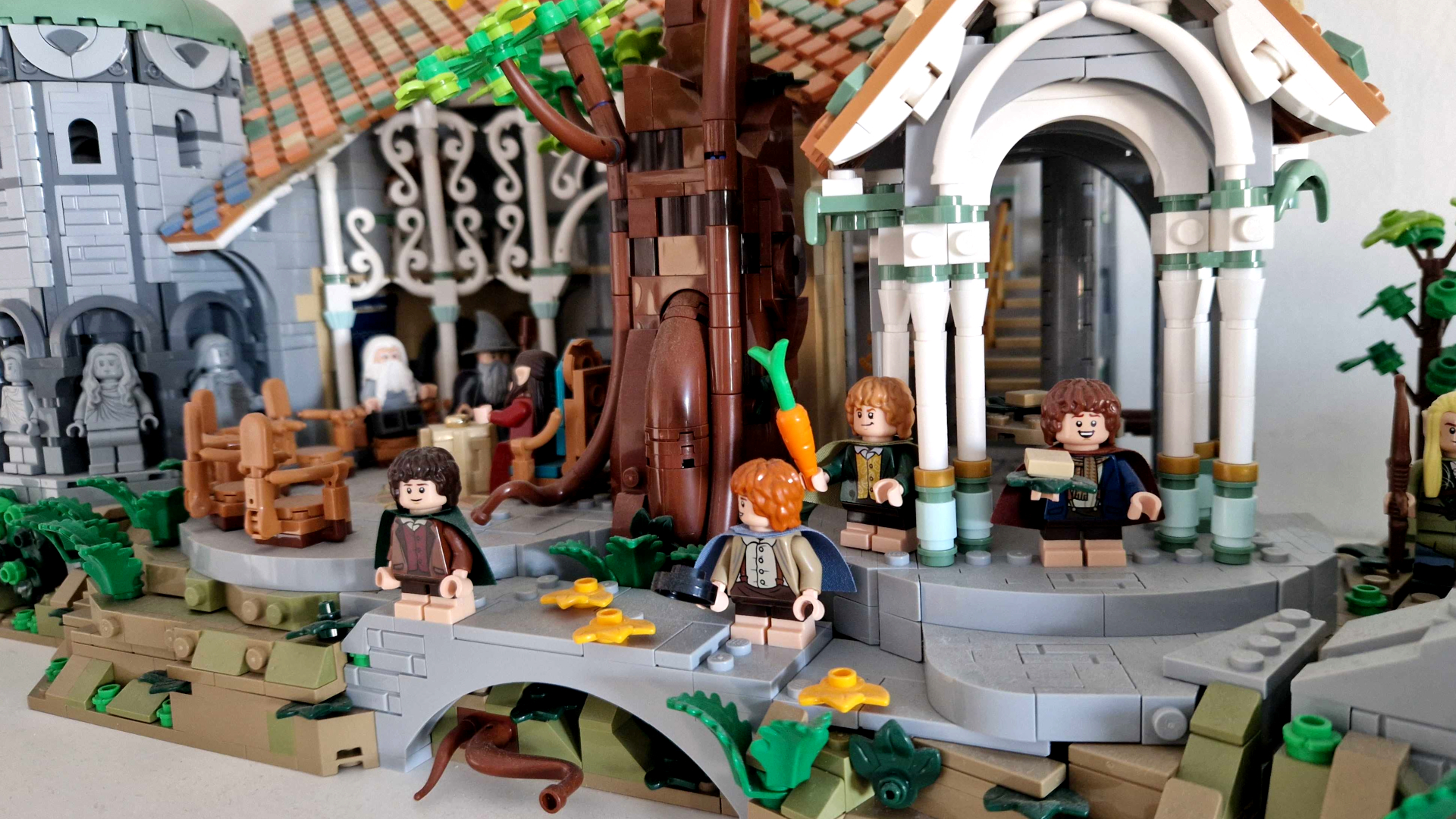 Hobbit minifigures scattered around Lego Rivendell