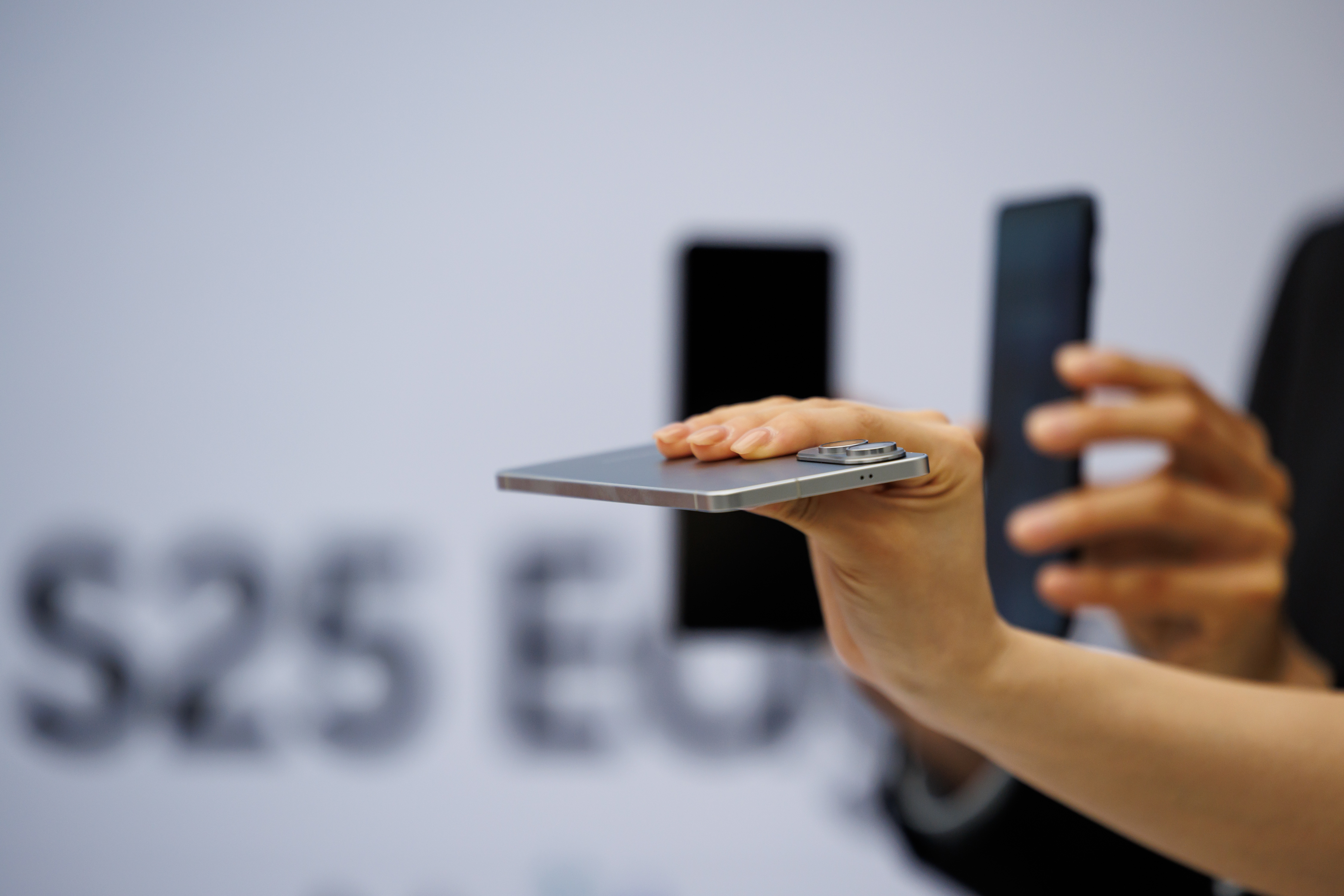 Samsung Galaxy S25 Edge smartphones during a launch event in Seoul, South Korea, on Tuesday, May 13, 2025. Samsung Electronics Co.&#039;s latest device, which goes on sale in the US on May 30 for $1,099, is 5.8 millimeters thick and weighs 163 grams, making it about 30% thinner and 25% lighter than the S25 Ultra, the company&#039;s highest-end smartphone. Photographer: SeongJoon Cho/Bloomberg via Getty Images