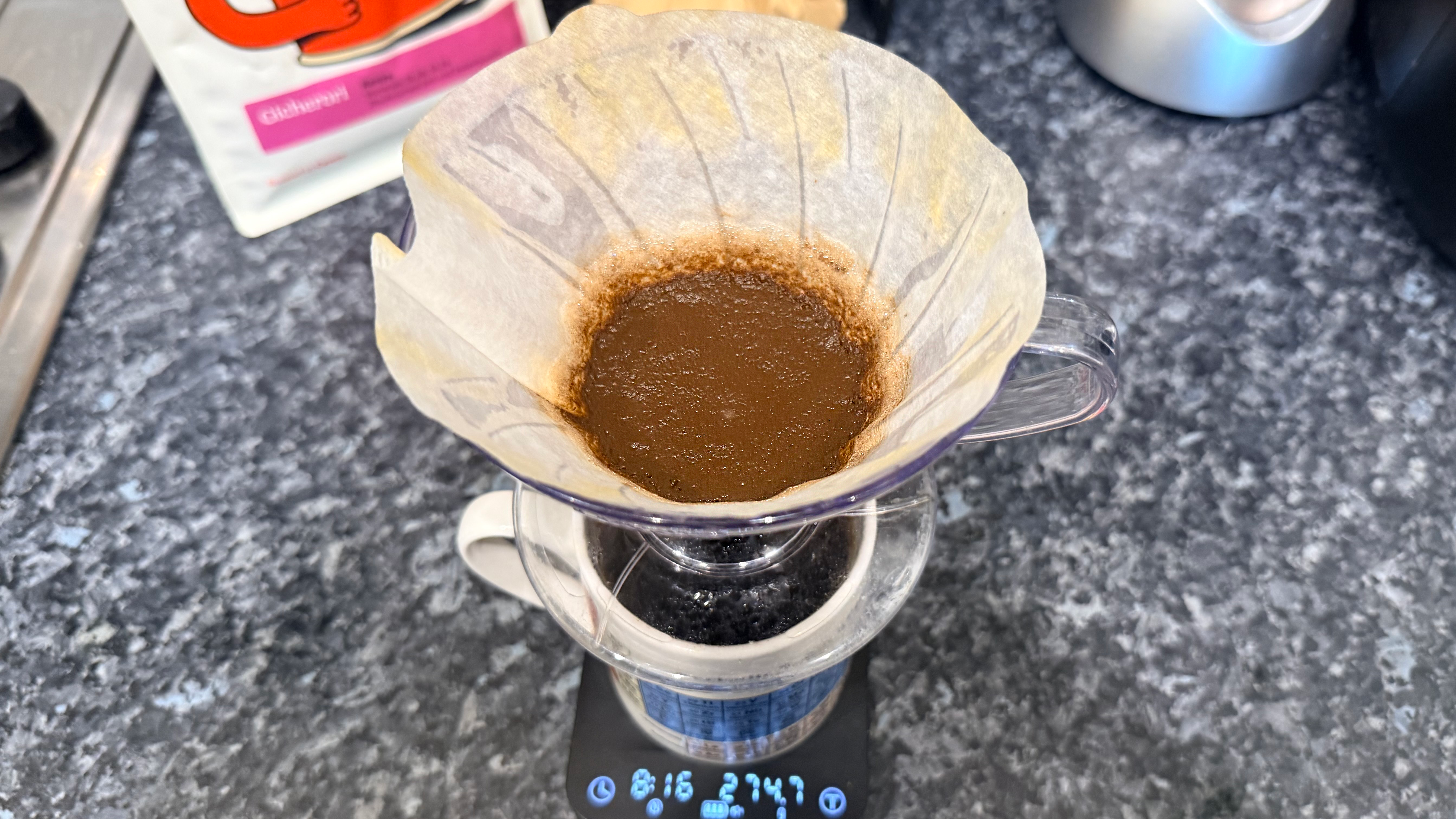 a photo of pour-over coffee made on the hario v60 dripper photographed with the wacaco exagram pro coffee scale