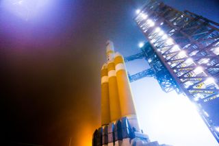 The Mobile Service Tower (MST) is rolled back at Space Launch Complex-6 in preparation for launch of a United Launch Alliance Delta IV Heavy rocket carrying the NROL-65 mission for the National Reconnaissance Office.