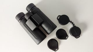 The binoculars with included lens covers