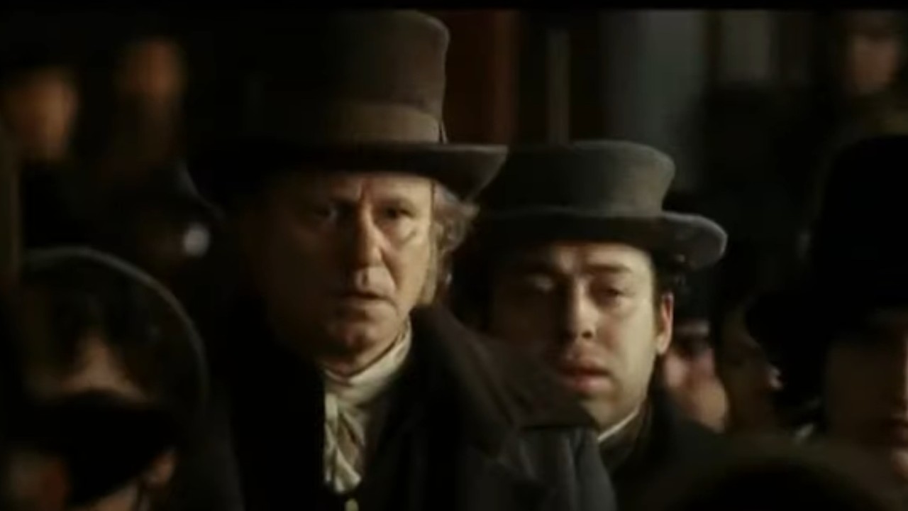 Stellan Skarsgard wearing a tall hat in Goya's Ghosts