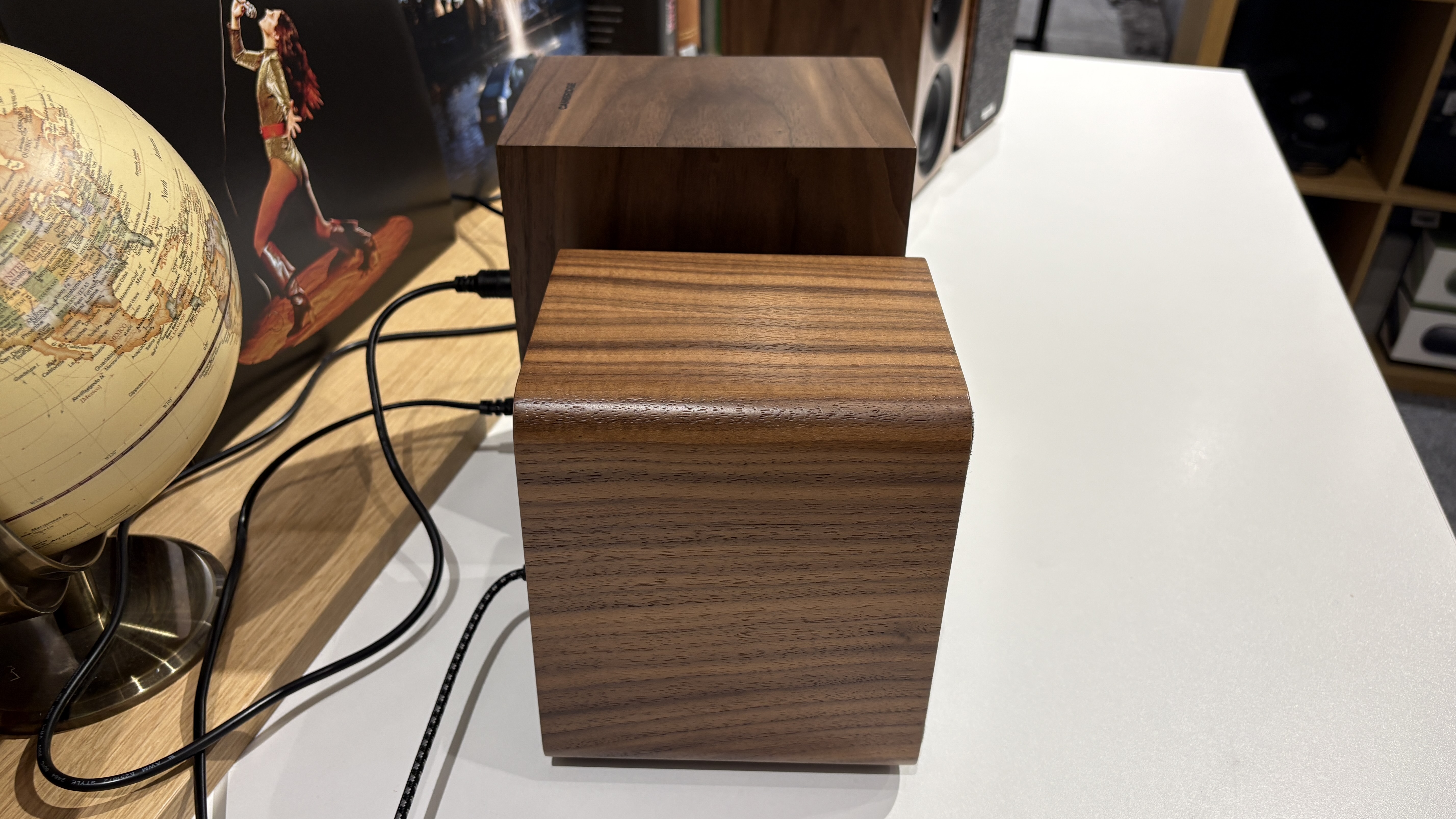 Ruark MR1 Mk3 and Cambridge L/R S speakers side-by-side on white table