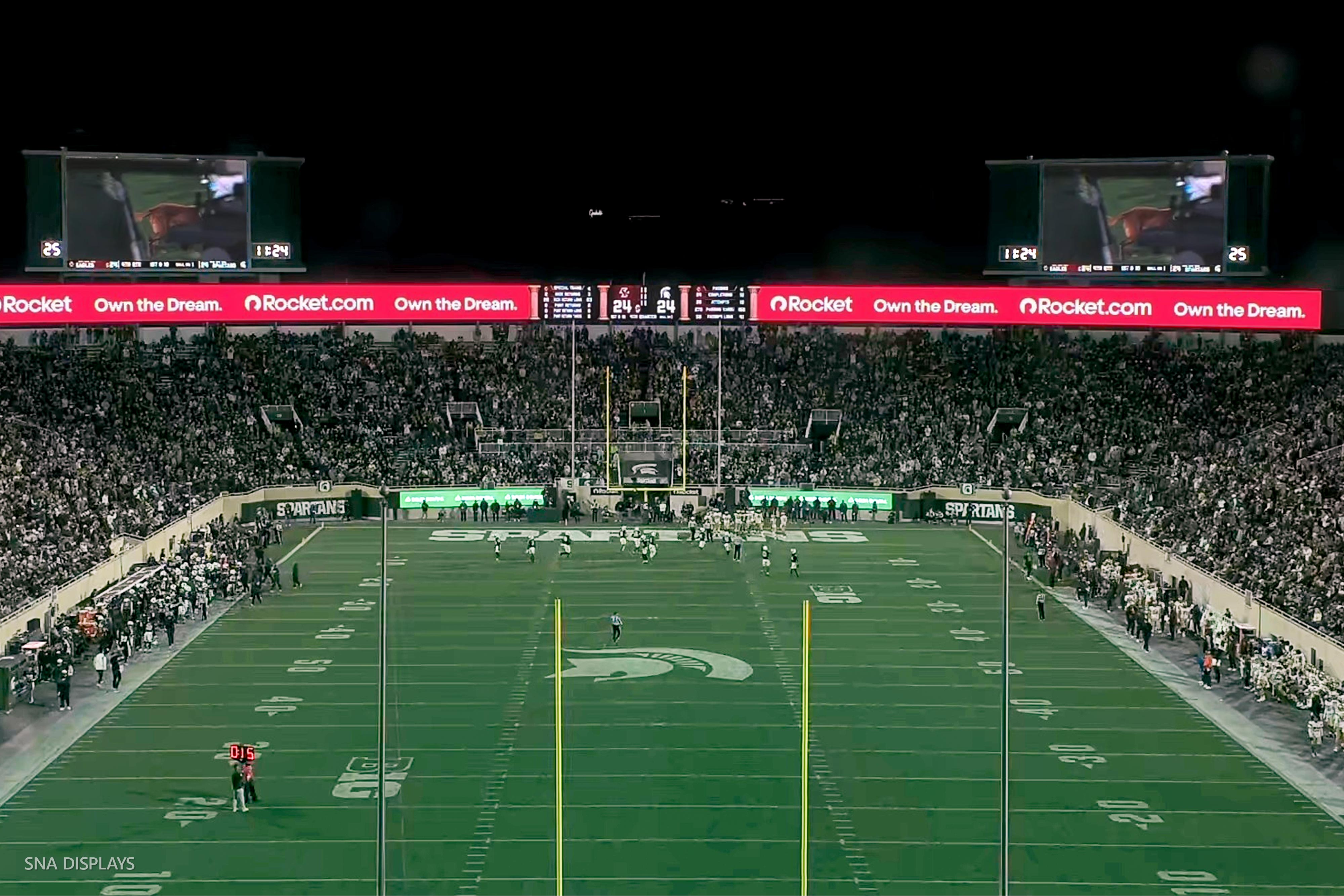 The new LED videoboard and pink LED ribbon seen every college football Saturday at Michigan State&#039;s Spartan Stadium.