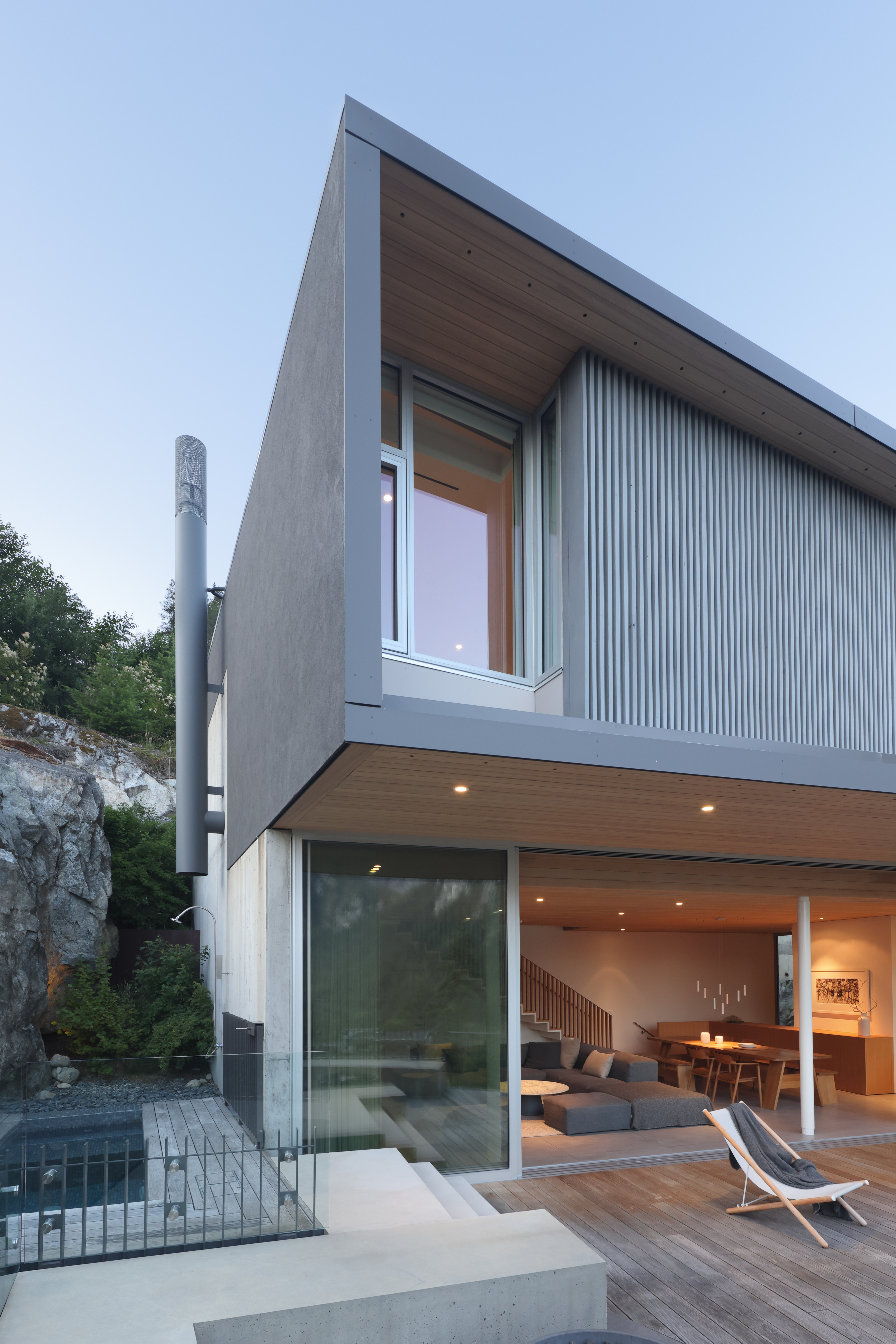 The house is set into the granite hillside