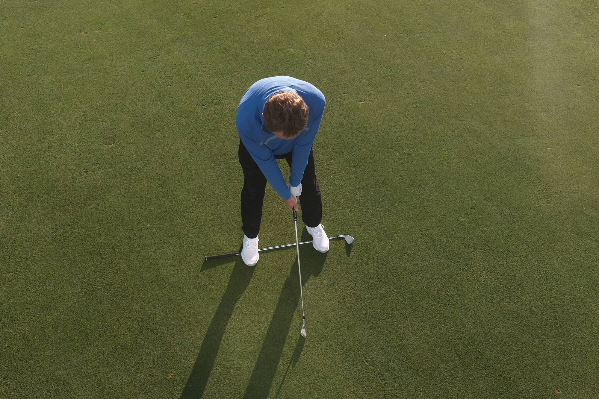Keith Wood from an aerial view showing the correct posture for the golf swing and appropriate balance points