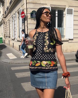 Instagram photo of Lena Farl in crochet top and denim skirt
