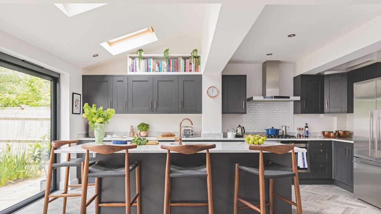 kitchen with bifold doors and skylights