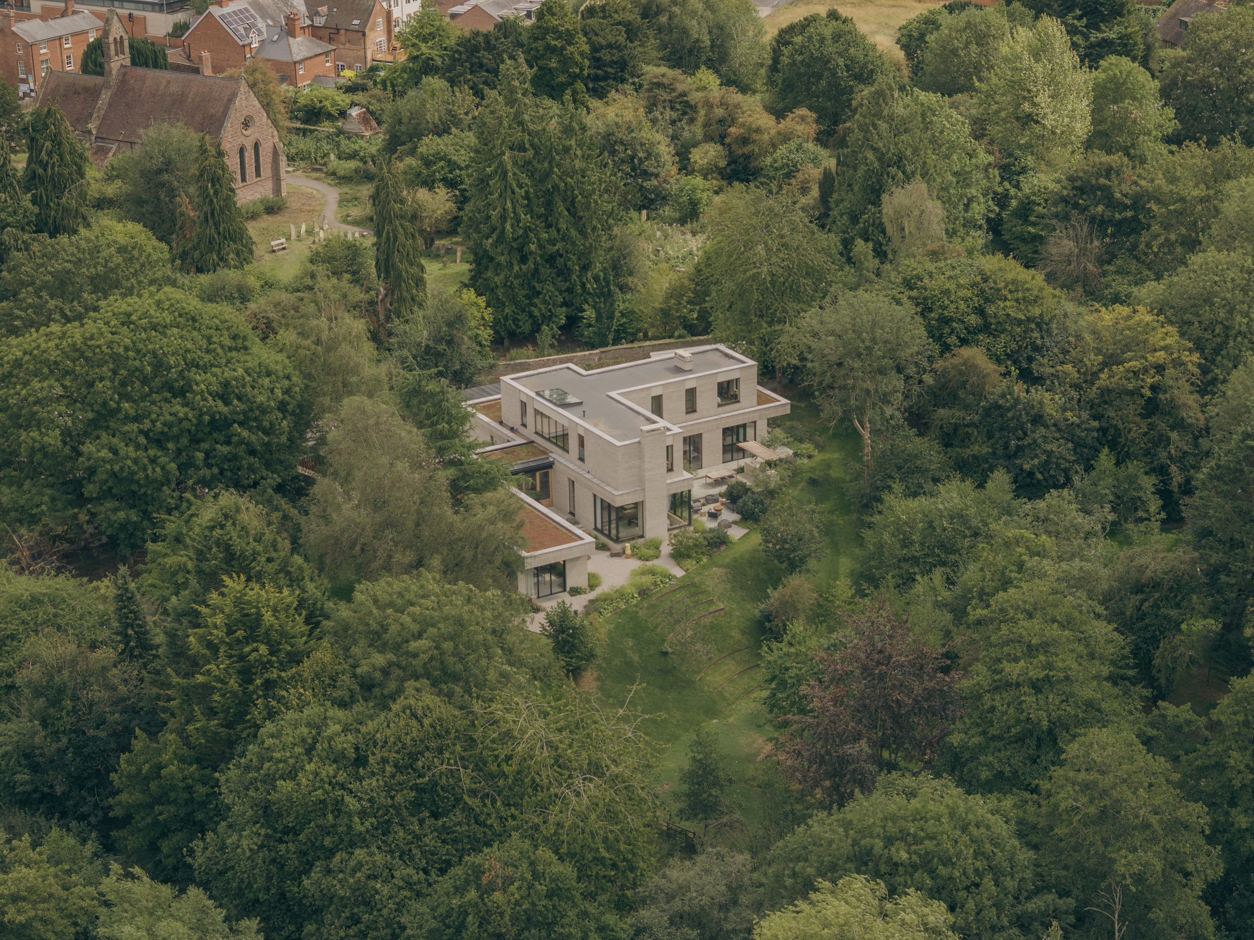 Skylark by House of EM, a minimalist riverside home in the leafy countryside