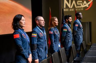The crew of the Atlas mission to Mars, from left to right: China's Lu Wang (Vivian Wu), Russia's Misha Popov (Mark Ivanir), the United States' Emma Green (Hilary Swank), India's Ram Arya (Ray Panthaki) and the United Kingdom's Kwesi Weisberg-Abban (Ato Essandoh), as seen in the new Netflix dramatic series "Away."