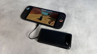 Anker 20,000mAh 87W power bank plugged into Nintendo Switch 2 with Mario Kart World in play