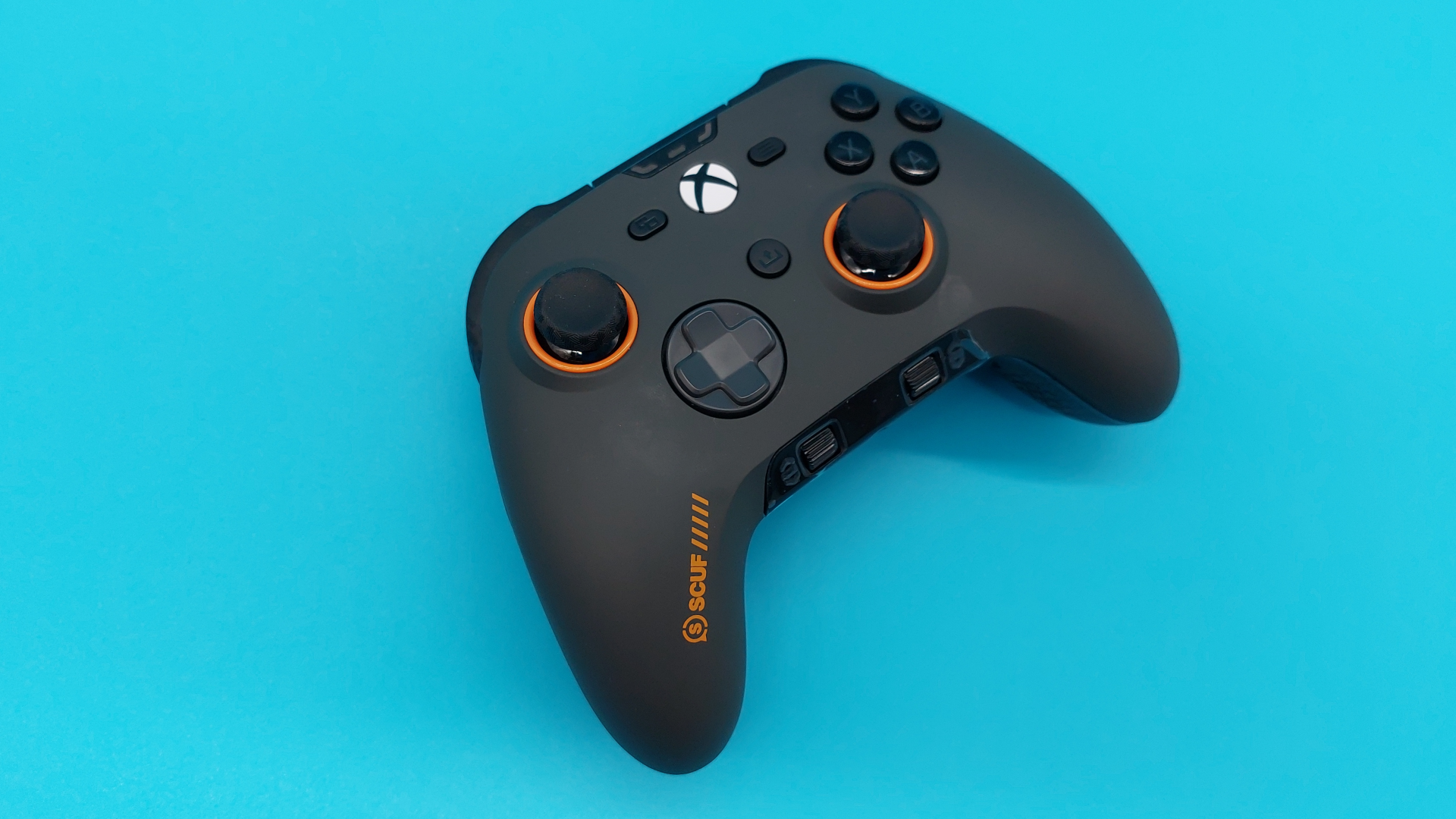 The Scuf Valor Pro wireless controller seen from various angles.