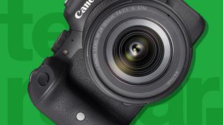 The Canon EOS R6 camera on a green background