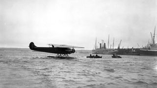 Amelia Earhart is pictured in the Solent at Southampton after completing an ocean flight from Newfoundland in her seaplane, "The Friendship."